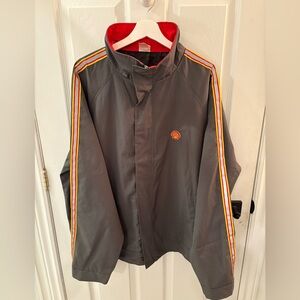 Gray Shell Gas Jacket with Red and Yellow Accents